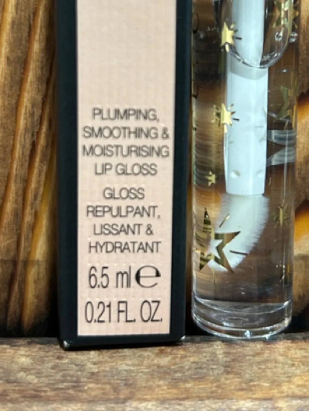 Gucci Clear Lip Gloss with Gold Star Accents